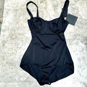 NWT Norma Kamali One Piece Black Size M.